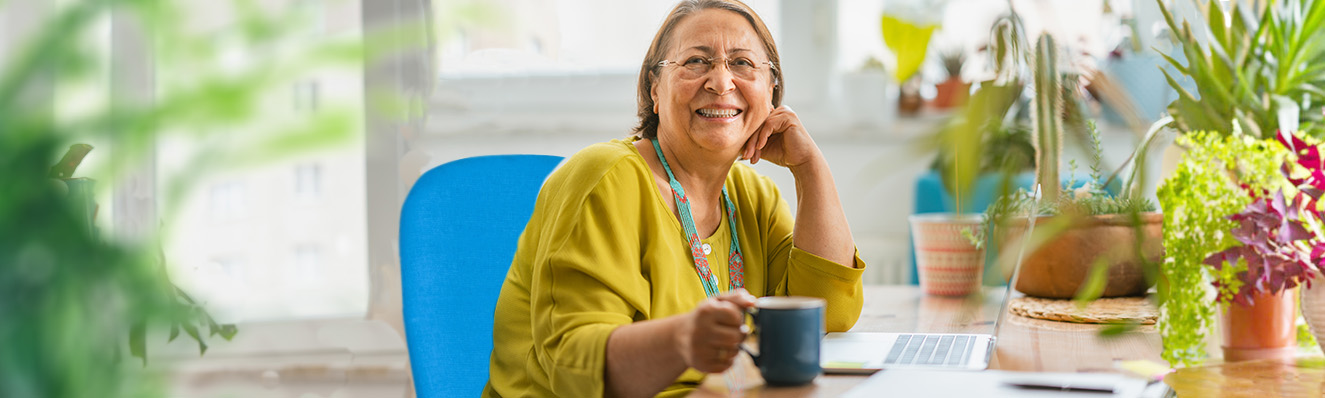 Lady sitting with a hot drink