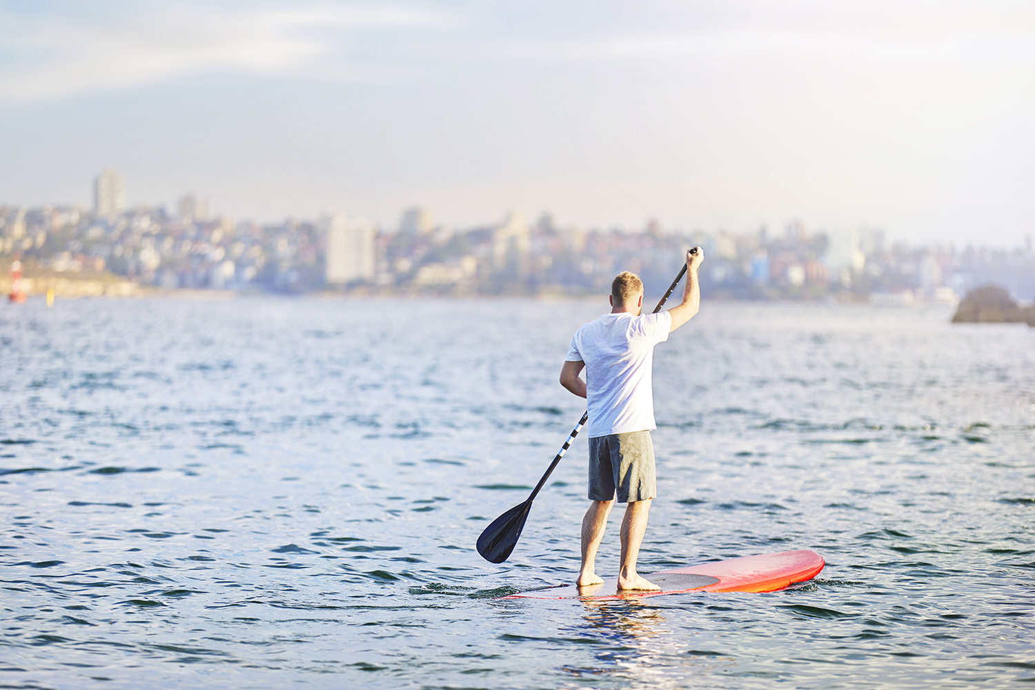 Man on stand up paddle board